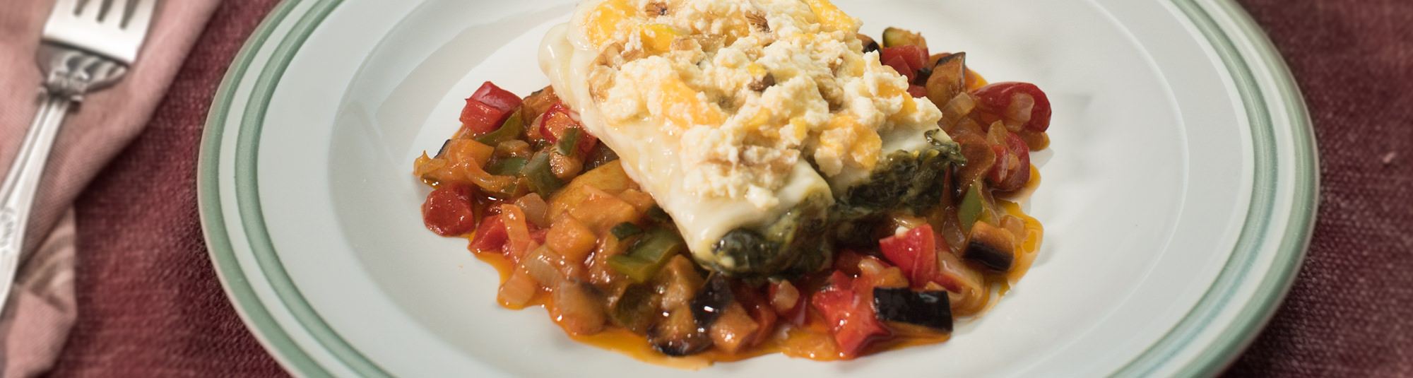 Canelones de espinacas y requesón con mango